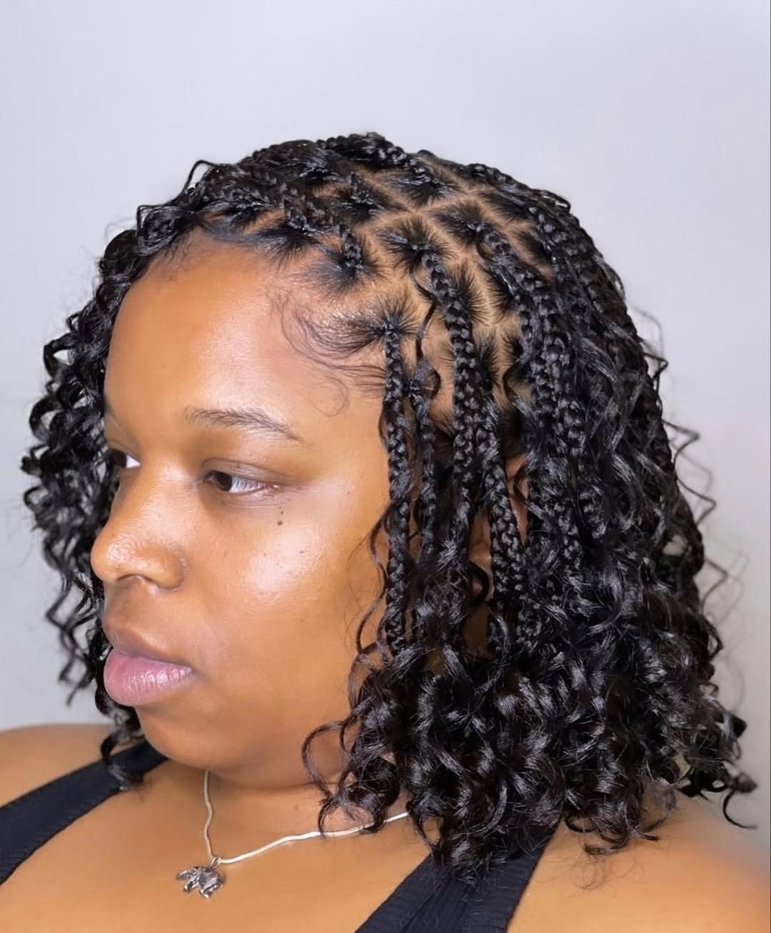 Curly twist braids side profile