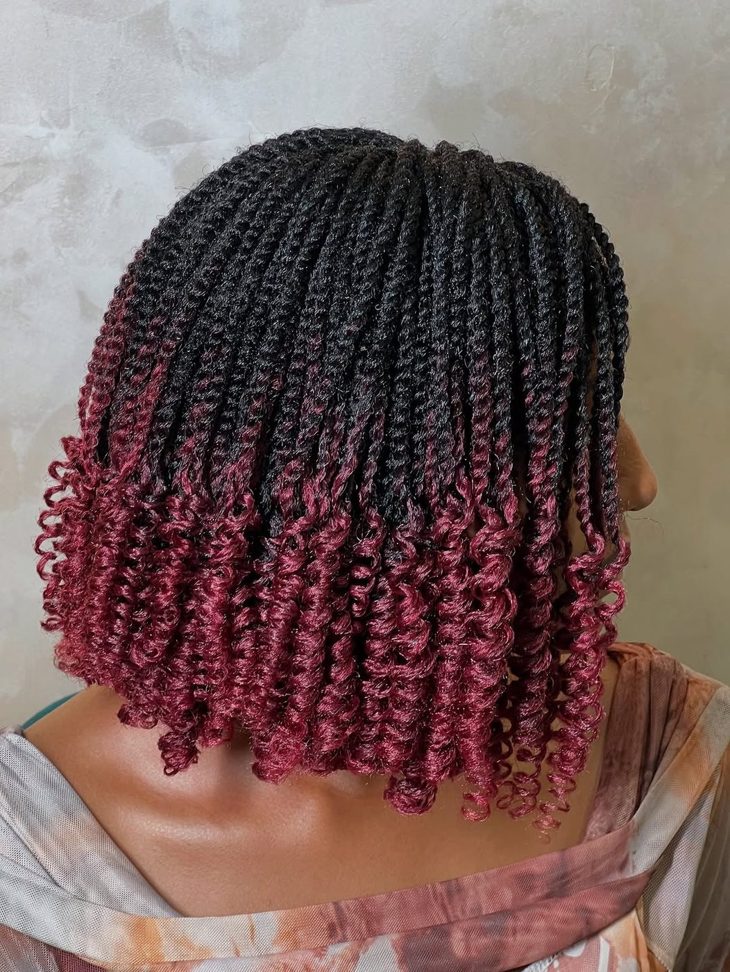 Burgundy red curly bob hairstyle